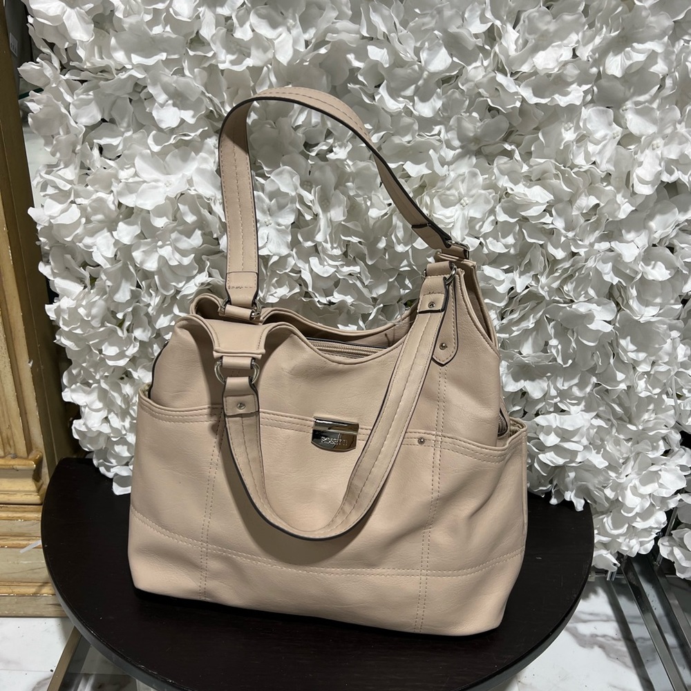 This is a new Rossetti Tan purse 10x16 with two handles.